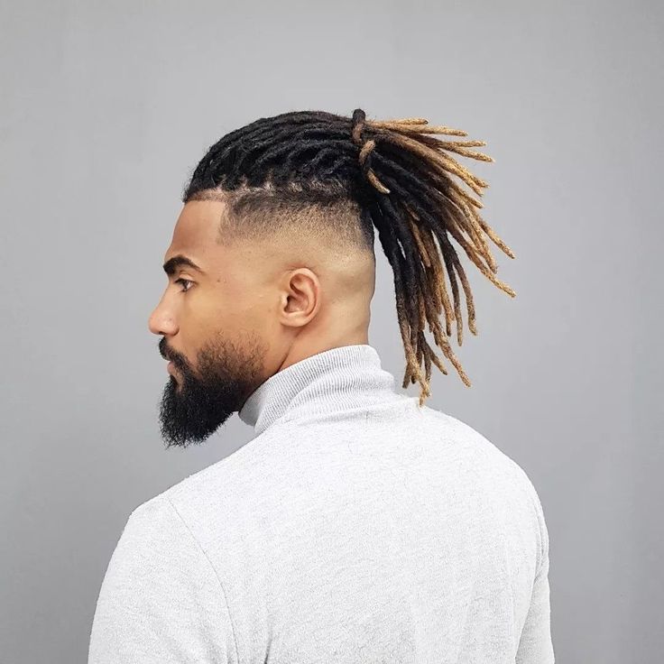 Shaved Sides with Dreadlock top knot Men Hairstyle